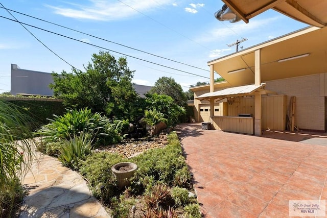 view of yard with a patio