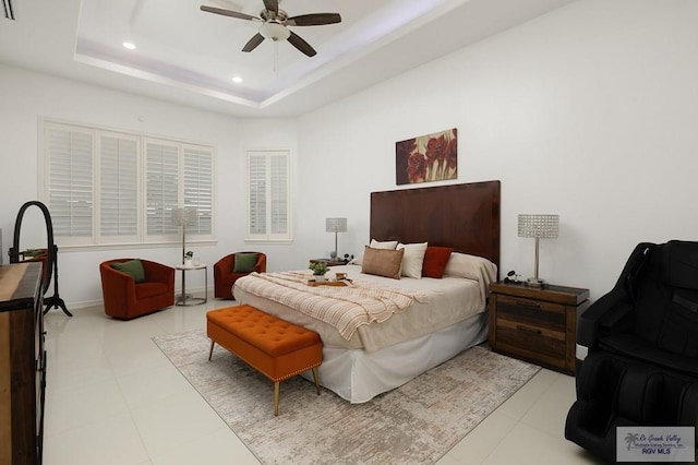 bedroom featuring a ceiling fan, recessed lighting, and a raised ceiling