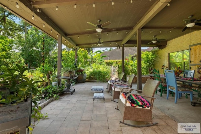 1808 E Palm Valley Dr, Harlingen, TX 78552 - view of patio / terrace featuring a ceiling fan and outdoor dining space