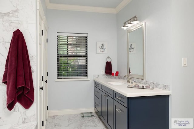 1808 E Palm Valley Dr, Harlingen, TX 78552 - bathroom featuring marble finish flooring, vanity, ornamental molding, and baseboards