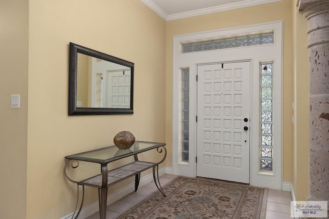 1808 E Palm Valley Dr, Harlingen, TX 78552 - tiled foyer entrance featuring crown molding and baseboards