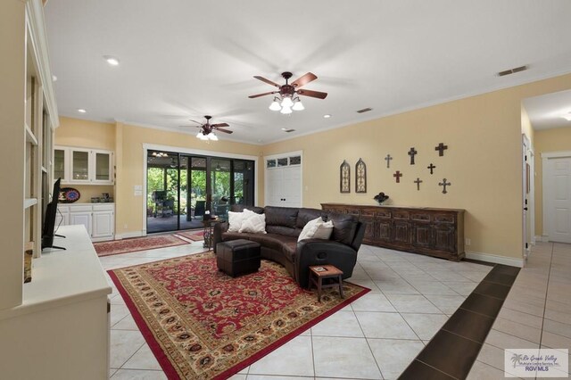 1808 E Palm Valley Dr, Harlingen, TX 78552 - living room featuring ceiling fan, light tile patterned floors, ornamental molding, baseboards, and recessed lighting