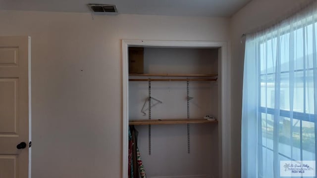 closet featuring visible vents