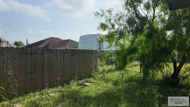 view of yard with fence
