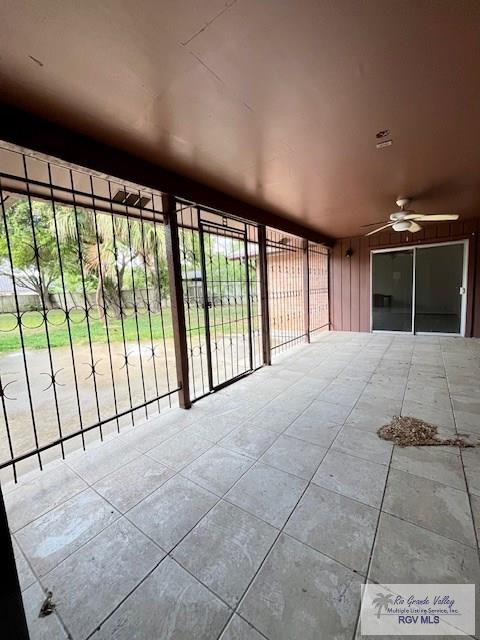 view of patio / terrace featuring ceiling fan