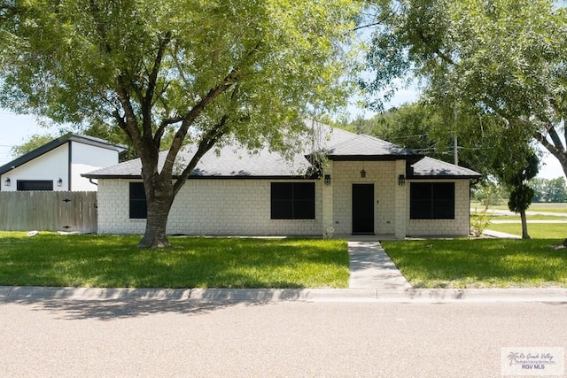 500 Parker Cir # 21, La Feria, TX 78559 - view of front facade with a shingled roof