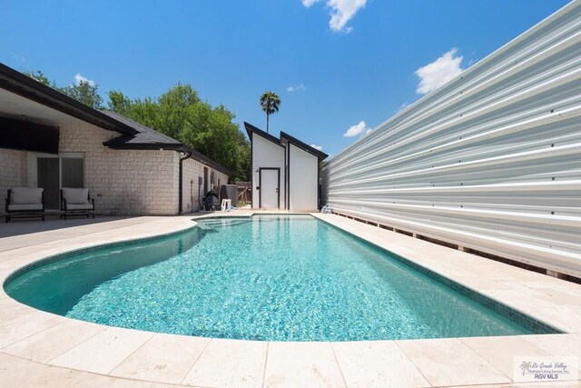 500 Parker Cir # 21, La Feria, TX 78559 - swimming pool with a patio