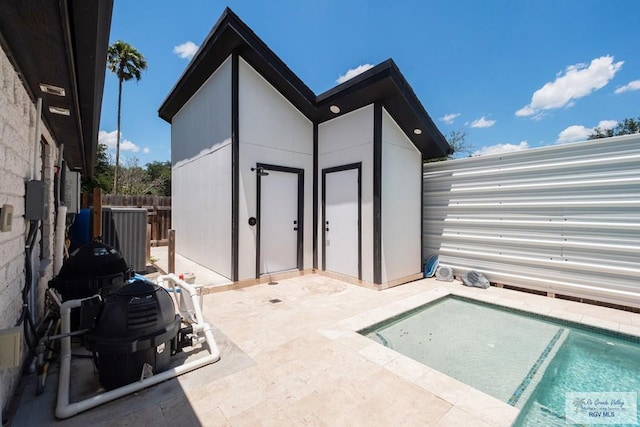 500 Parker Cir # 21, La Feria, TX 78559 - view of outdoor structure featuring cooling unit and fence