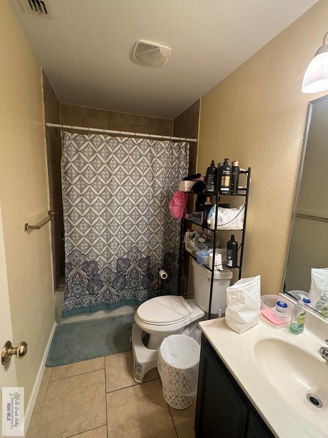 2965 Monte Cristo Dr, Brownsville, TX 78526 - bathroom with vanity, tile patterned floors, and shower / tub combo with curtain