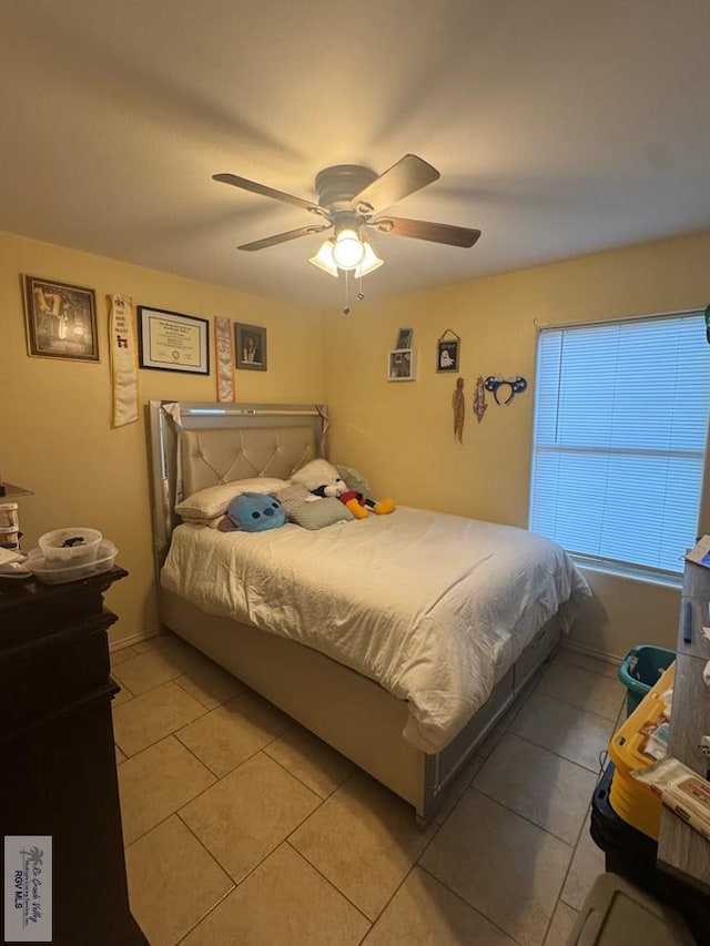 2965 Monte Cristo Dr, Brownsville, TX 78526 - bedroom featuring light tile patterned floors and a ceiling fan