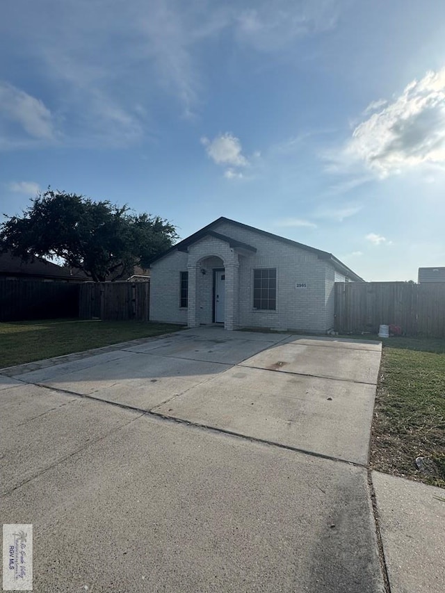 2965 Monte Cristo Dr, Brownsville, TX 78526 - ranch-style house featuring driveway and brick siding