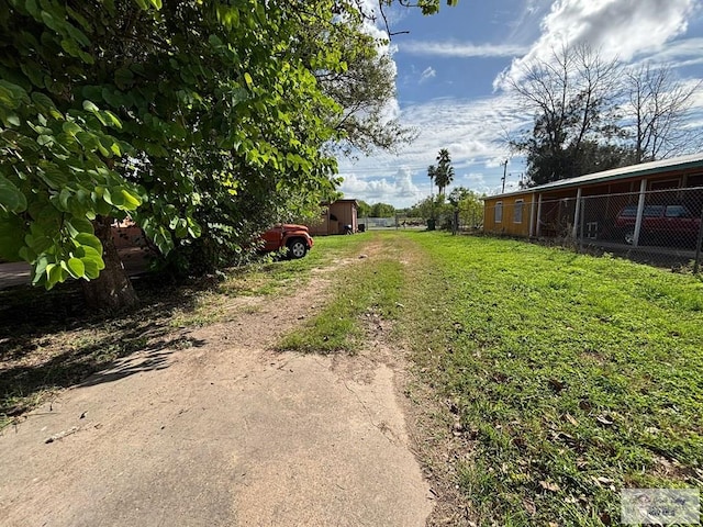 view of yard featuring fence