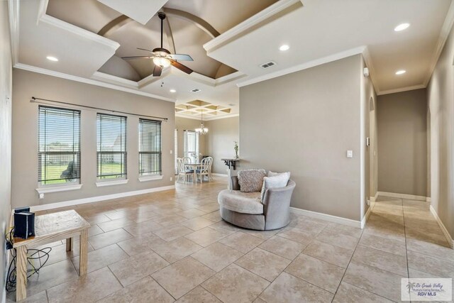 1510 Karis Ct, Harlingen, TX 78550 - living area with coffered ceiling, ceiling fan, recessed lighting, crown molding, and a chandelier