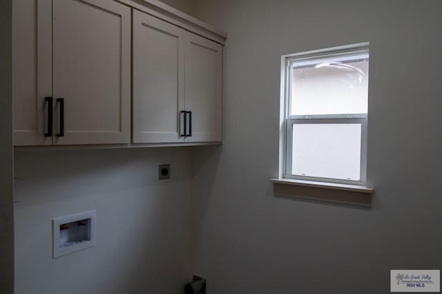 1272 Bridle Way, San Benito, TX 78586 - washroom featuring hookup for a washing machine, cabinet space, and hookup for an electric dryer