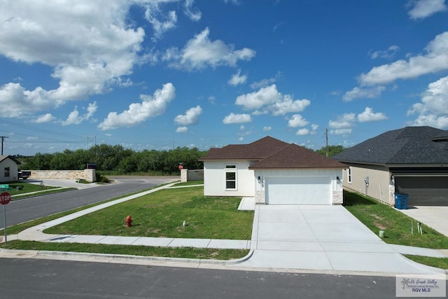 1272 Bridle Way, San Benito, TX 78586 - view of front of property featuring a front lawn, driveway, stucco siding, and a garage