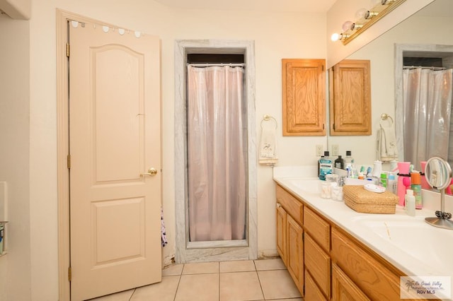 bathroom with tile patterned floors, curtained shower, vanity, and a wall mounted air conditioner