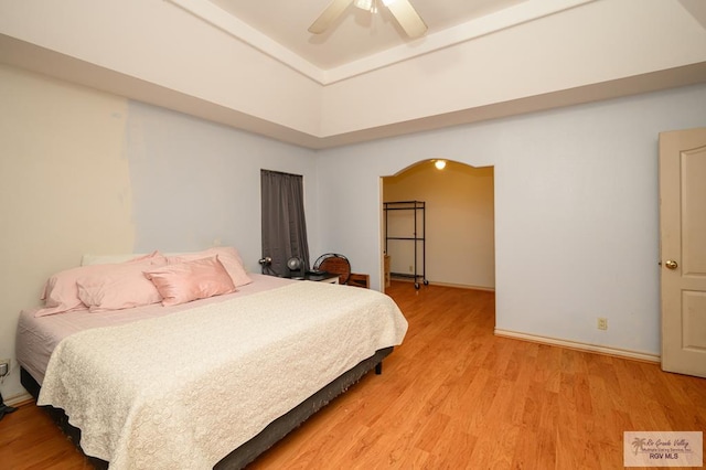 bedroom featuring ceiling fan and hardwood / wood-style floors