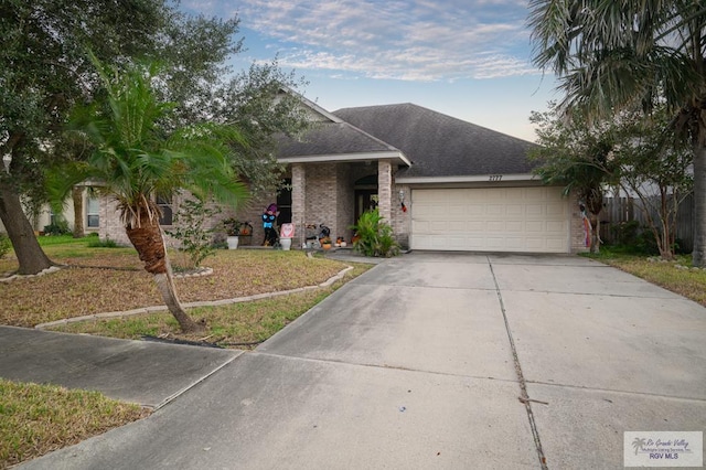 single story home with a garage