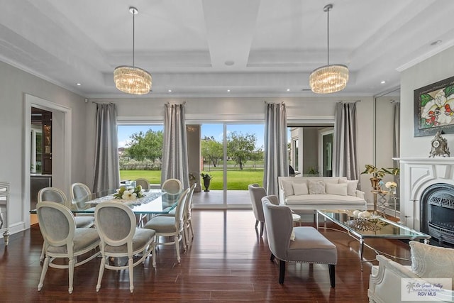 dining space featuring crown molding, a chandelier, and dark hardwood / wood-style floors