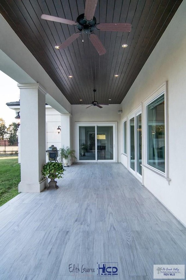 view of patio / terrace with area for grilling and ceiling fan