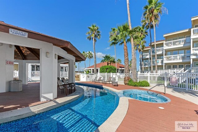 view of pool featuring a patio