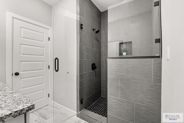 bathroom featuring walk in shower