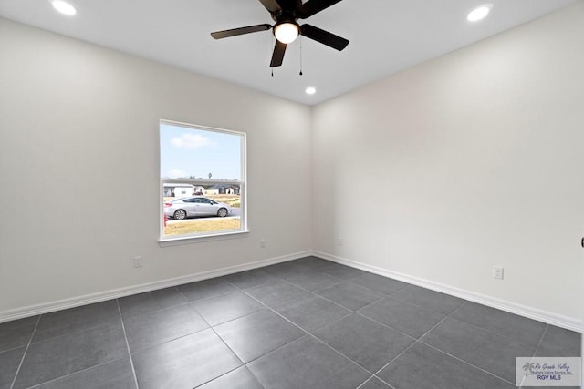 473 Santiago St, La Feria, TX 78559 - empty room featuring recessed lighting, baseboards, dark tile patterned flooring, and a ceiling fan