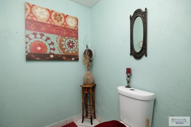 bathroom with tile patterned flooring