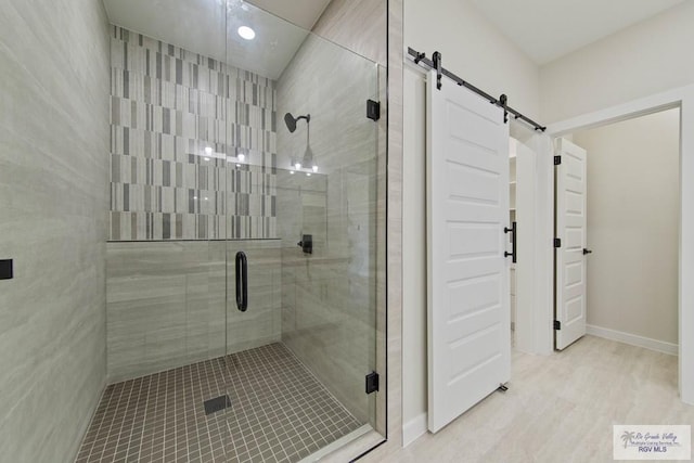 23547 Murphy Ct, Harlingen, TX 78552 - bathroom featuring a shower stall and baseboards