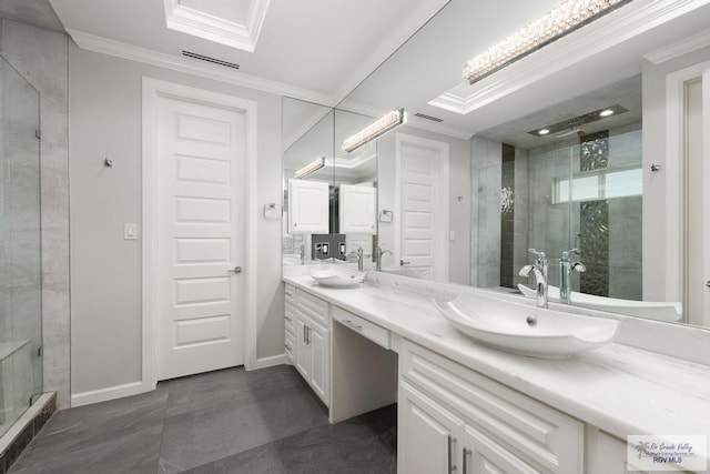 bathroom featuring vanity, crown molding, and a shower with shower door