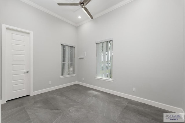 spare room with ceiling fan and ornamental molding