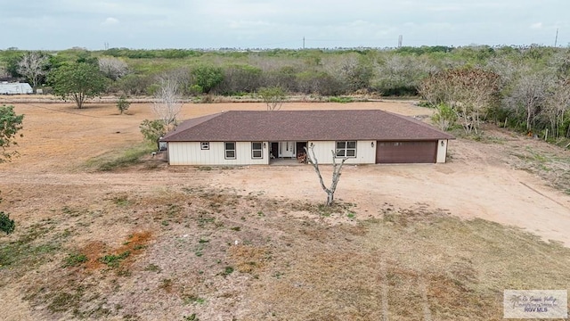 single story home featuring a garage