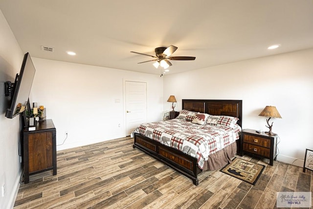 bedroom featuring hardwood / wood-style flooring and ceiling fan