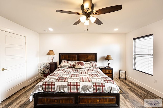 bedroom featuring hardwood / wood-style floors and ceiling fan