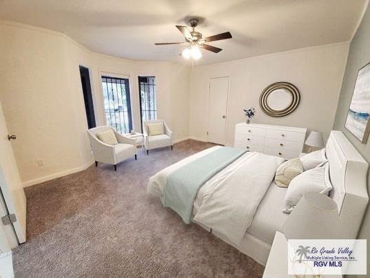 carpeted bedroom featuring ceiling fan and baseboards