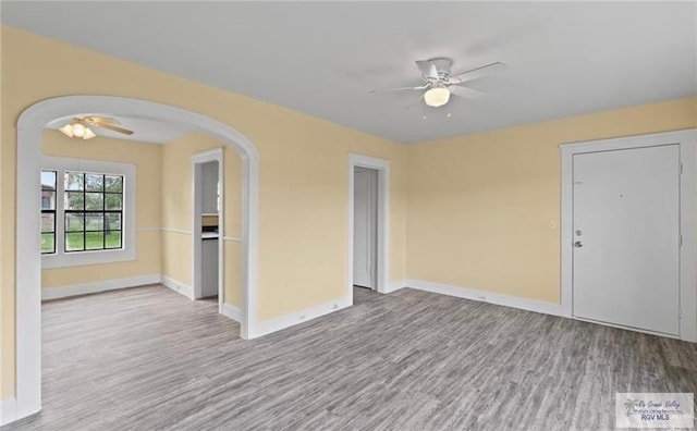 284 Corona Crescent Cir, San Benito, TX 78586 - empty room with a ceiling fan, wood finished floors, and baseboards
