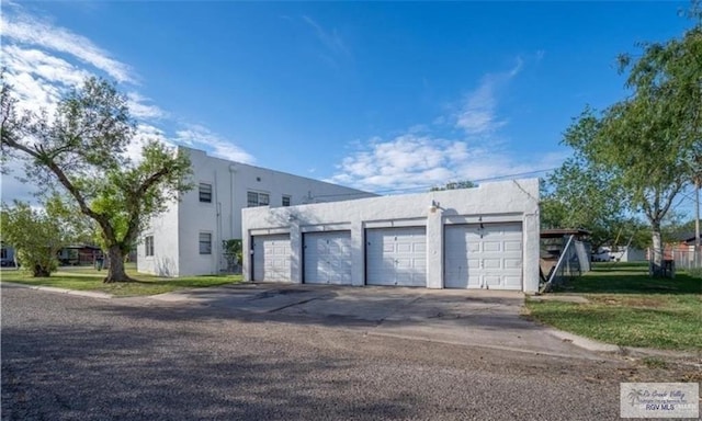284 Corona Crescent Cir, San Benito, TX 78586 - view of side of home with stucco siding