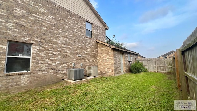 2839 Regency Dr, Brownsville, TX 78526 - view of yard featuring central air condition unit