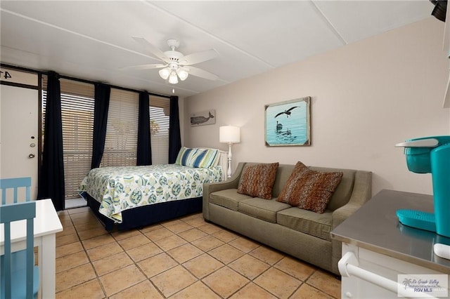 110 E Pompano St, South Padre Island, TX 78587 - bedroom featuring light tile patterned flooring and ceiling fan
