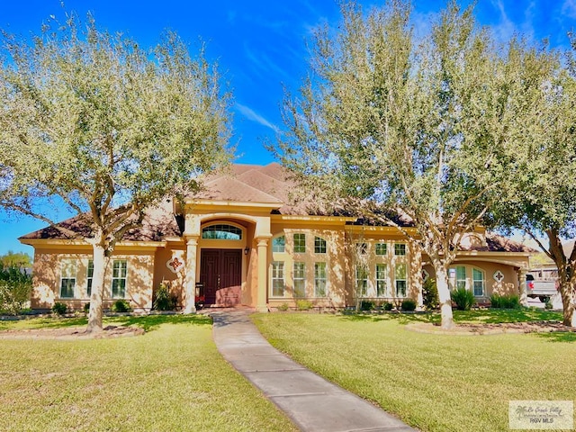 view of front of house with a front yard