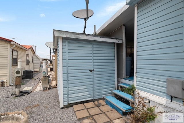 view of outbuilding featuring cooling unit