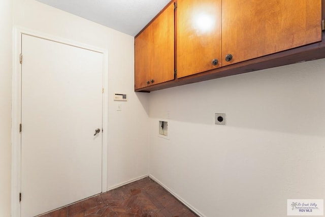 laundry area featuring electric dryer hookup, cabinets, and hookup for a washing machine