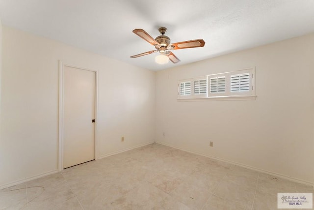 spare room featuring ceiling fan