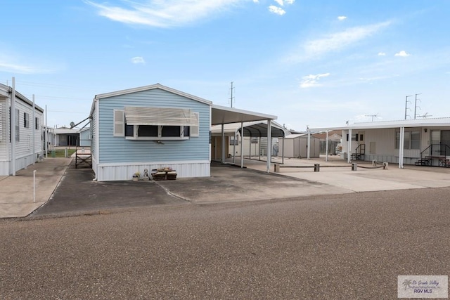 manufactured / mobile home with a carport