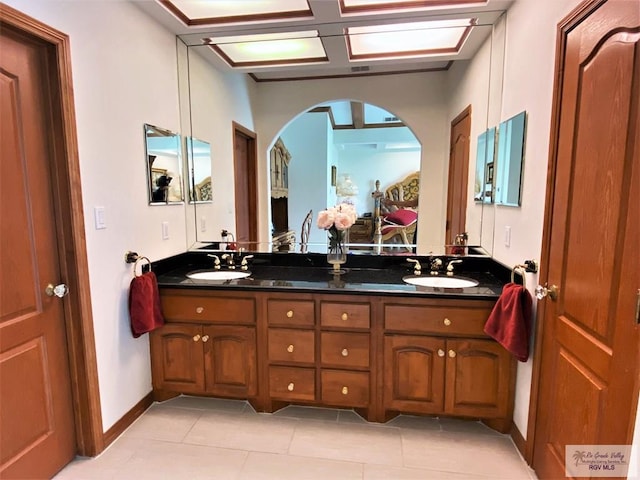 bathroom featuring tile patterned floors and vanity