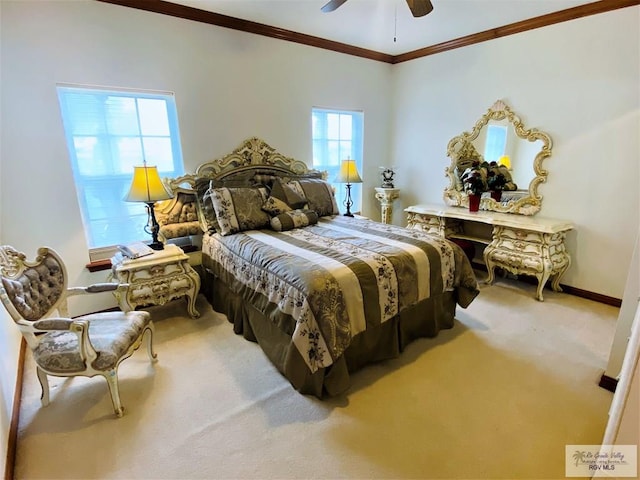 bedroom with ceiling fan, carpet, and ornamental molding