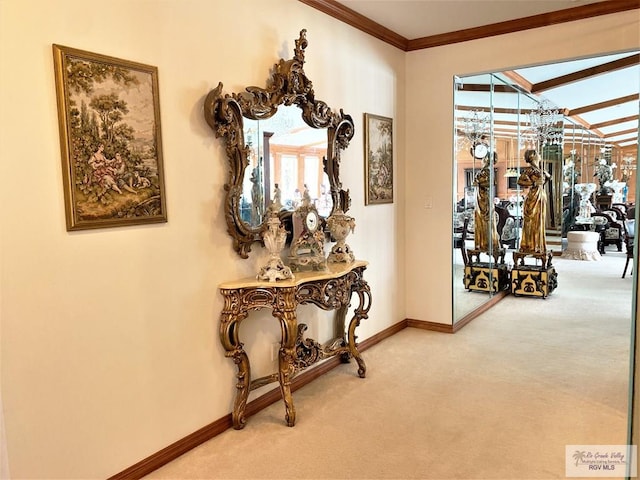 corridor with carpet floors and ornamental molding