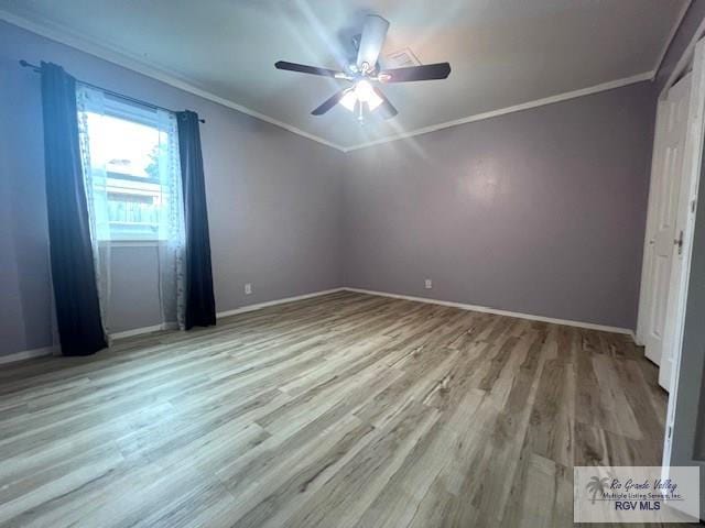 unfurnished bedroom featuring crown molding, ceiling fan, and light wood-type flooring