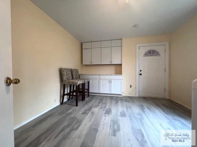 interior space with hardwood / wood-style flooring