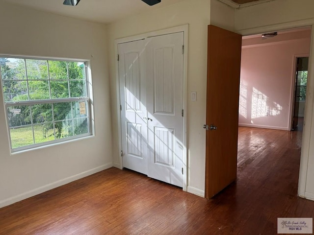 54 Shary Ave, Brownsville, TX 78521 - unfurnished bedroom with wood-type flooring and a closet